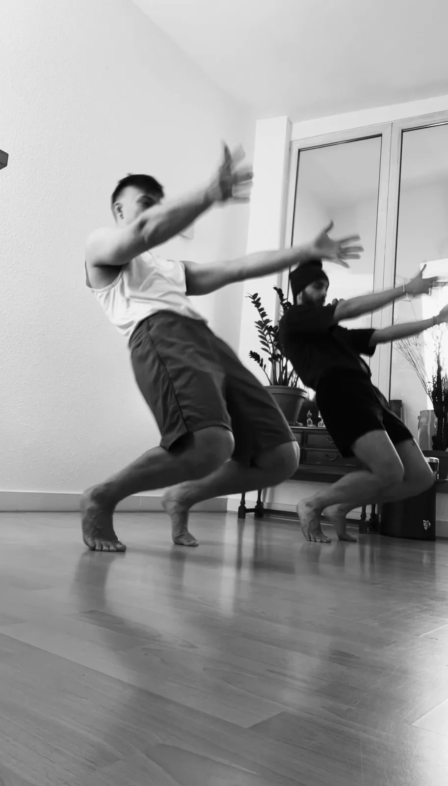 Two people practising the ginga